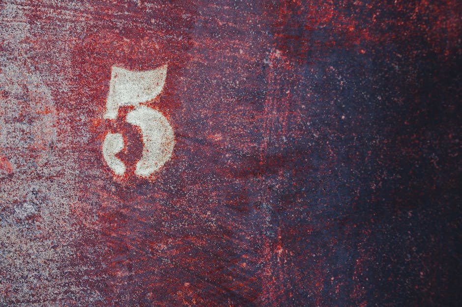 Grungy wall with number 5