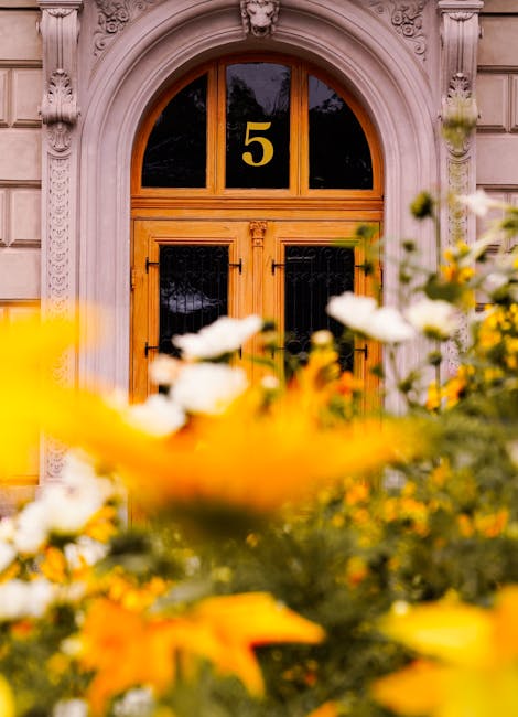 Gold number 5 on ornate door